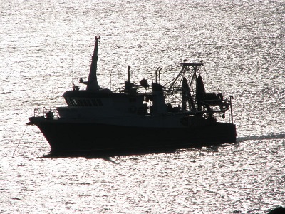 Family fishing vessel at dusk